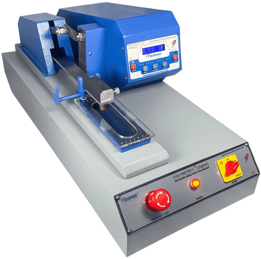Crock meter test being performed on dyed fabric sample in a textile testing lab